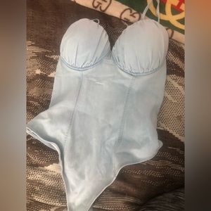 Never worn. Light blue Jean thong body suit